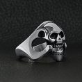 SCR2059-Polished-Skull-Stainless-Steel-Ring-Lifestyle-Side_45748f9e-a60e-4a60-ab0d-6f77db714c99.jpg