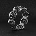 SCR3041-Detailed-Multi-Skull-Stainless-Steel-Polished-Ring-Lifestyle-Standing_5f5ae006-aea8-42df-94ee-2cbde57a30f9.jpg