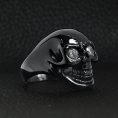 SCR4054-Clear-CZ-Stone-Eyed-Black-Skull-Stainless-Steel-Ring-Lifestyle-Side_630c1aaa-96af-4e66-9e3b-5cabde6d3ee2.jpg