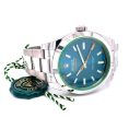 rolex-milgauss-blue-dial-green-crystal-116400gv-oyster.jpg
