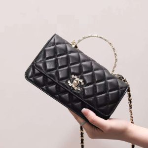 CHANEL 24S Metal letter wrist kelly woc