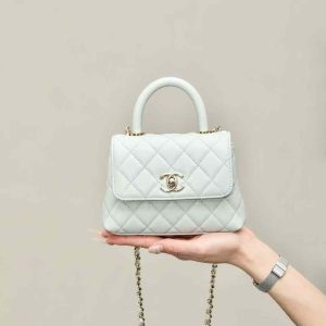 CHANEL MINI FLAP BAG WITH TOP HANDLE